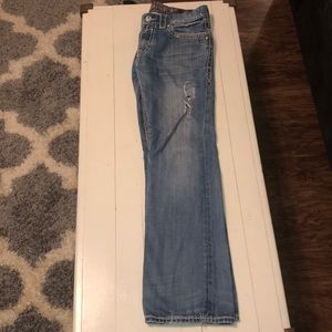Used rock revival jeans 32